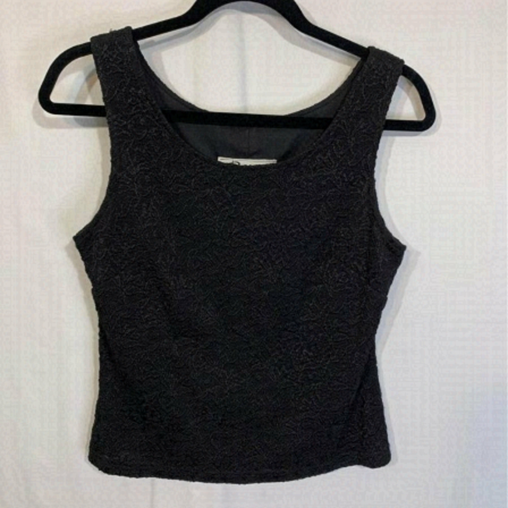 WOMAN’S RIBKOFF lined lace tank top. Size medium. Stretchy. Excellent condition.